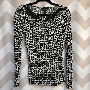 Black and white top with beaded neckline